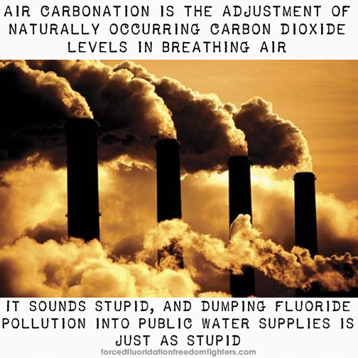 Smoke belching from the smokestacks of a coal-fired power station. Text at top: Air carbonation is the adjustment of naturally occurring carbon dioxide levels in breathing air – Text at bottom: It sounds stupid, and dumping fluoride pollution into public water supplies is just as stupid