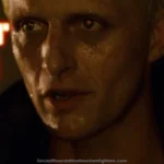 Roy Batty (Rutger Hauer) from the film Bladerunner, just before killing his creator. Text: I WANT MORE LIFE, F'ER