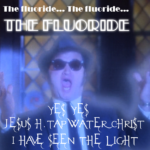 Caption: money and religion – John Belushi in church scene in the film The Blues Brothers. Text at top: The fluoride… The fluoride… THE FLUORIDE – Text at bottom: YES YES JESUS H. TAPWATER CHRIST I HAVE SEEN THE LIGHT